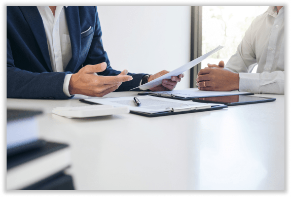 Inspector with tablet checking car